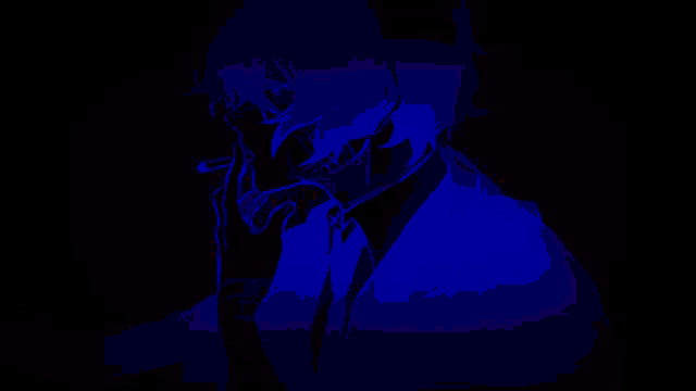 a man in a suit and tie is smoking a cigarette in the dark