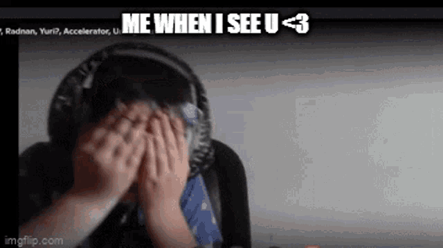a person with headphones covering their face with their hands and the words me when i see u < 3 on the bottom