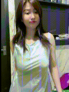 a pixelated image of a woman 's face and breasts