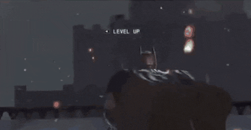a blurred image of a person in a video game with the words level up visible