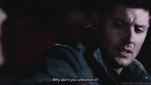 a man is talking to a woman in a dark room and saying `` why don 't you unbutton it '' .
