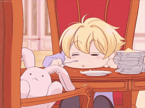 a cartoon character is sitting at a table with a stack of plates and a stuffed rabbit
