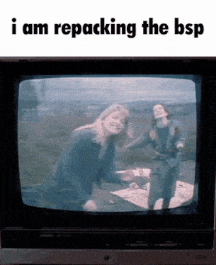 two women are dancing in front of a tv screen that says " i am repacking the bsp "