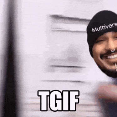 a man wearing a black beanie and a nose ring is smiling and says tgif .