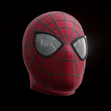 a close up of a red spider man helmet