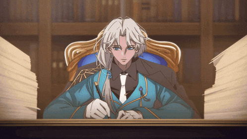 a man with long white hair is sitting at a desk with a pen in his hand
