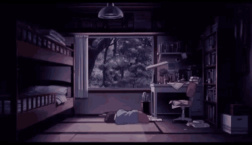 a girl is laying on the floor in a bedroom with bunk beds .
