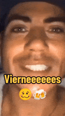 a close up of a man 's face with the words " vierneeees " written on it