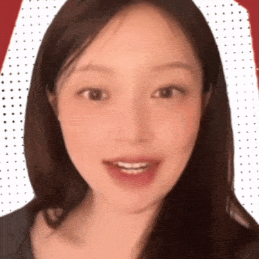 a close up of a woman 's face with a red polka dot background