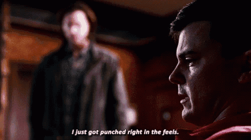 a man is talking to another man in a dark room and saying `` i just got punched right in the feels '' .