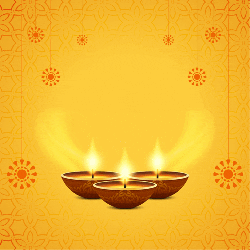 three lit candles on a yellow background with flowers