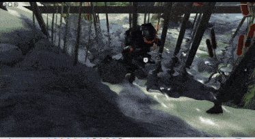 a screenshot of a video game shows a person in a forest