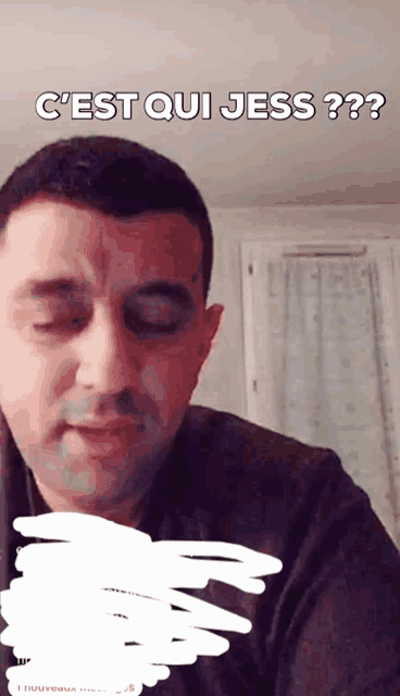 a man with his eyes closed and the words c'est qui jess written on his face