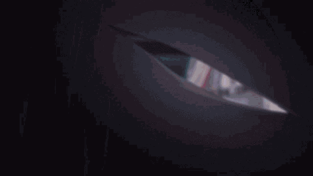 a close up of a person 's arm and leg in a dark room
