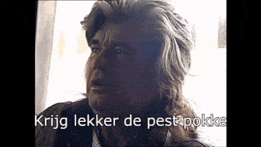 a close up of a man with the words " krijg lekker de pest pokke " below him