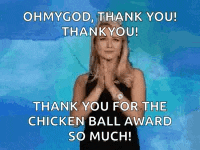 a woman is saying thank you for the chicken ball award