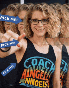 a woman wearing glasses and a coach angels tank top points at the camera