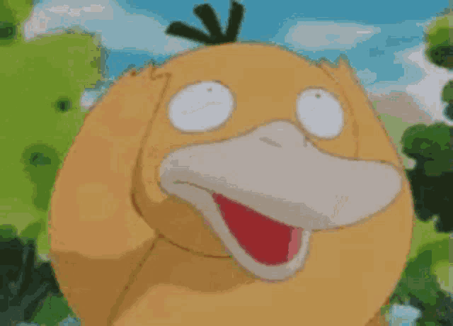 a close up of a cartoon duck making a funny face with its mouth open .