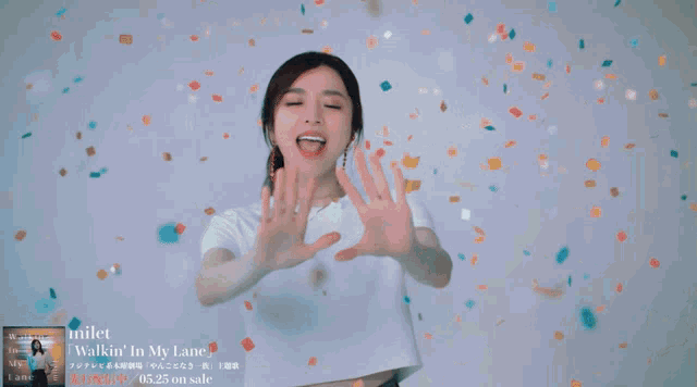 a woman singing a song called walkin ' in my lane is surrounded by other people