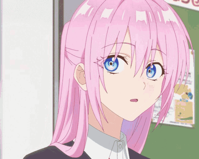 a girl with pink hair and blue eyes is looking at the camera