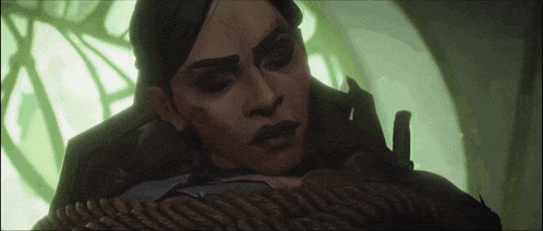 a woman is tied up with a rope and a knife in a room .