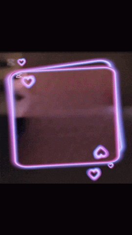 a pink square with hearts on it and a black background