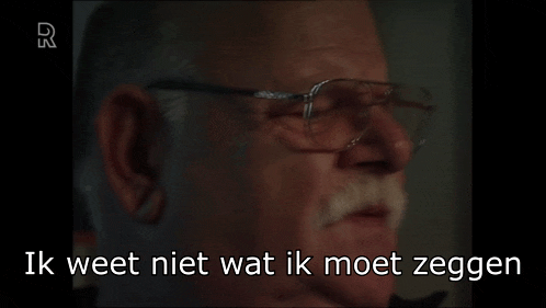 a man with glasses and a mustache says maar die jongens is gewoon in a foreign language