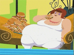 a woman is sitting on a couch eating sandwiches
