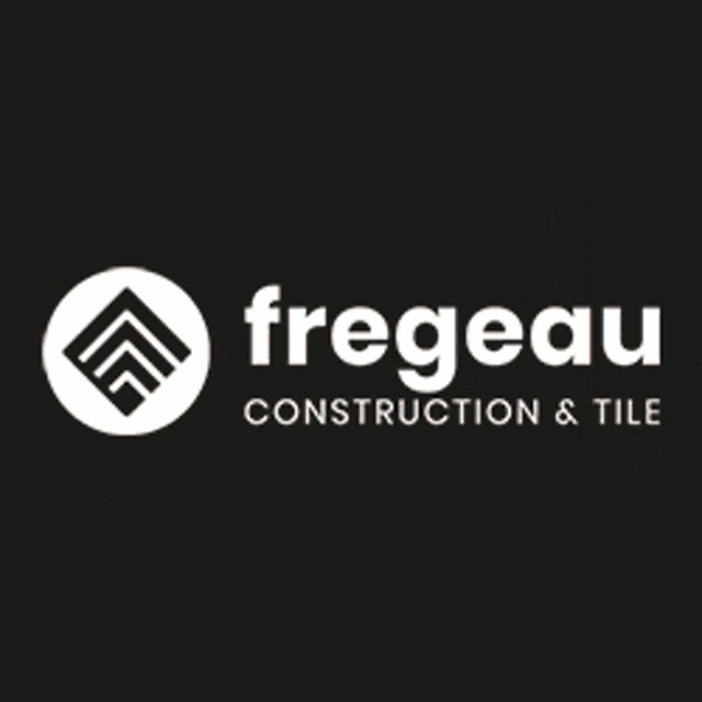a kitchen with blue tiles and a fregeau logo