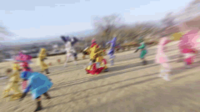 a blurry picture of a group of people dressed in costumes