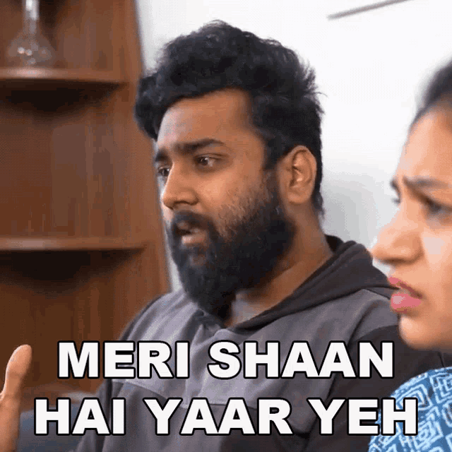 a man with a beard says " meri shaan hai yaar yeh " next to a woman