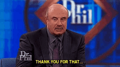 a man in a suit and tie says thank you for that on a dr phil show