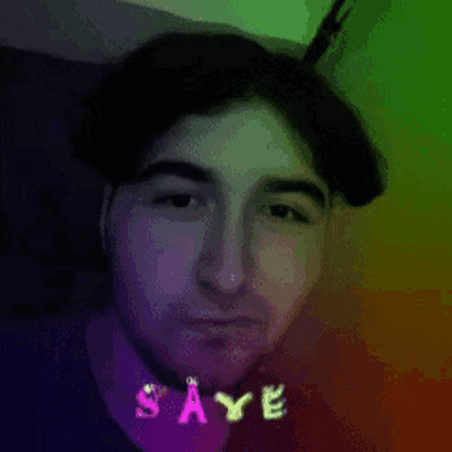 a close up of a man 's face with the word saye written on it