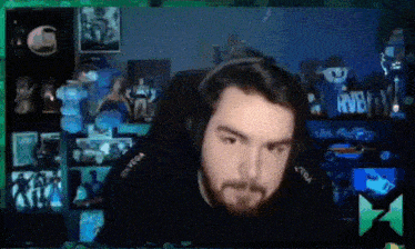 a man wearing headphones with the word vega on the side