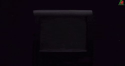 a tv screen with a purple background and a strawberry logo on the bottom right