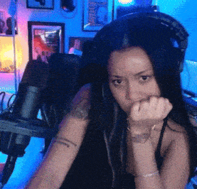 a woman with a tattoo on her arm that says ' i love you ' on it