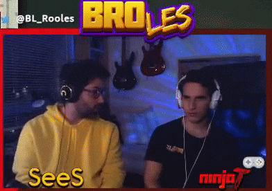 two men wearing headphones are sitting in front of a screen that says broles and sees