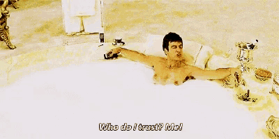 a man is laying in a bathtub with the words who do i trust me written on the bottom