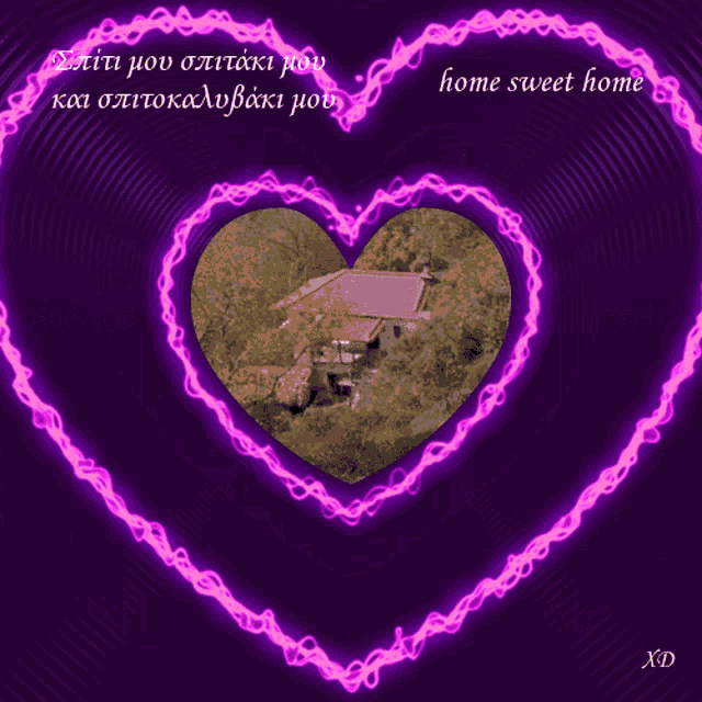 a purple heart with a picture of a house and the words home sweet home on the bottom