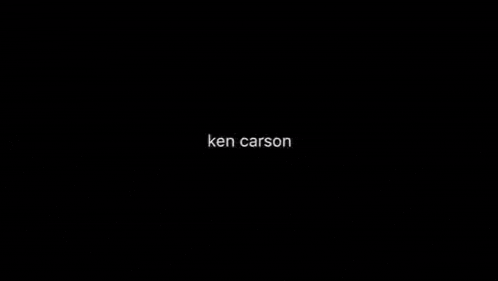a black and white photo of a man 's face with the camera4 written on the bottom