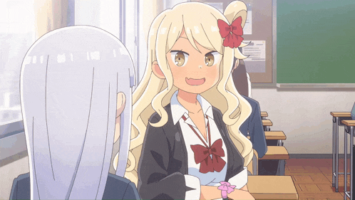 a girl with blonde hair and a red bow in her hair is talking to another girl