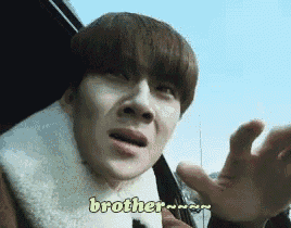 a young man is making a funny face and the word brother is written on his face