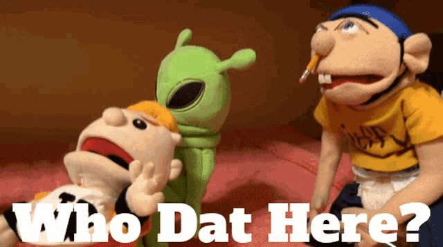 a group of stuffed animals standing next to each other with the words who dat here below them