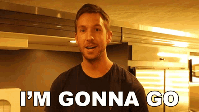 a man says " i 'm gonna go " in front of a refrigerator