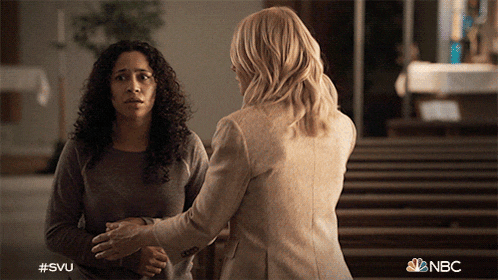 two women standing next to each other with a nbc logo in the corner