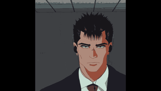 a man in a suit and tie with headphones on his head