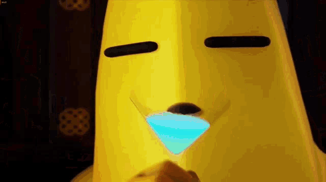 a person dressed as a banana is holding a martini glass with a blue liquid in it .