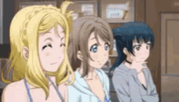 three anime girls are standing next to each other in a room and smiling .