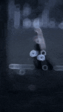 a blurry picture of a person 's face with the number 8 on the bottom right