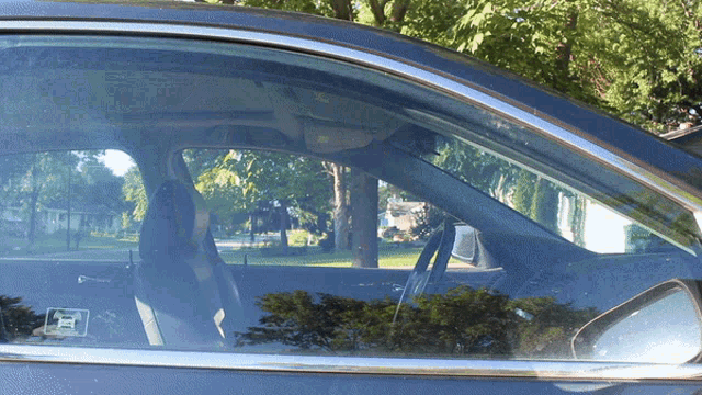 a car with a sticker on the window that says ' toyota '